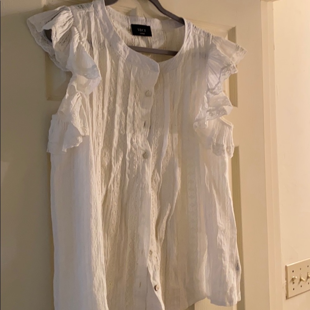 Women’s ruffle button down